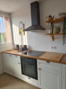 Appartements Vue apaisante montagnes, plage 5 minutes a pied : photos des chambres
