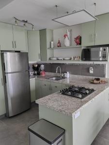 Beachfront Bliss at Aria Ocean Flamingos