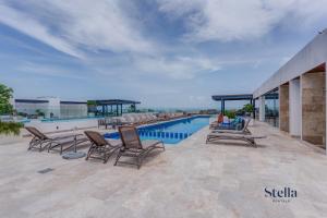 Ipana Condo, Rooftop Pools, Gym, Walk to Beach