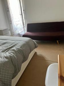 Appartements appartement 2 pieces 5min gare val d'Europe parking inclus : photos des chambres