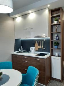 Select Lux Angella-Konaci