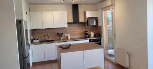 Appartements Cosy 51m2 proche gare pour Geneve et tram 3 min : photos des chambres