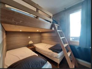 Appartement 4-6p Belle Plagne, skis aux pieds, vue montagne, ensoleillé