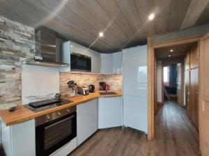 Appartement 4-6p Belle Plagne, skis aux pieds, vue montagne, ensoleillé