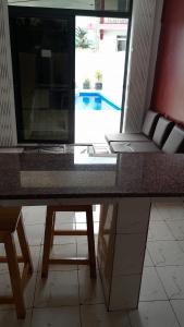 Appartement avec piscine à pomponette