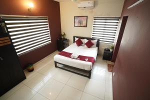Atmos Inn Calicut Near Aster Mims Hospital
