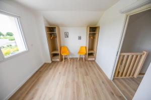 Maisons de vacances Chez Jean-Paul - Rez de jardin et parking : photos des chambres