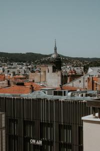 Appartements At home in Clermont, Place de Jaude : photos des chambres