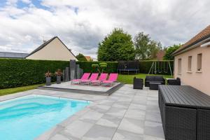 Villas Villa avec piscine chauffee proche circuit 24h : photos des chambres