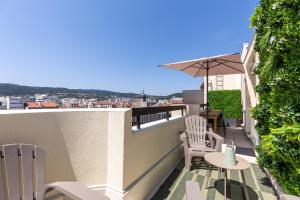 Appartements At home in Clermont, Place de Jaude : photos des chambres