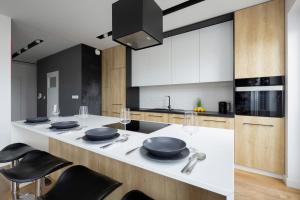 Apartment with Terrace & Parking by Noclegi Renters