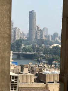 Skyscraper apartment with Nile & Pyramids view