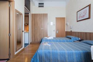 Twin Room with Kitchenette room in Residence Lepontina