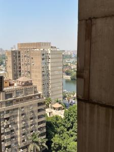 Skyscraper apartment with Nile & Pyramids view