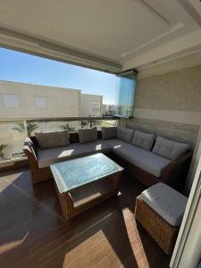 Bel appartement avec piscine vu sur mer - Ubytování bez kategorie ve městě Sidi Rahal