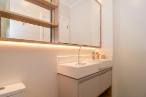 Apt moderno a uma quadra da Praia Brava VT4055