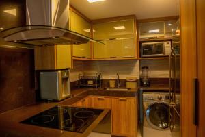 In Mare Bali Flat Marbella by Qavi