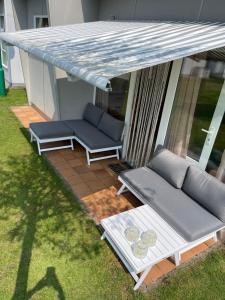 Rustig vakantiehuisje Coester De Haan - 2 slaapkamers