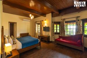 StayVista at Sylvana Villas with Lawn, BBQ and Jacuzzi