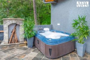 StayVista at Sylvana Villas with Lawn, BBQ and Jacuzzi