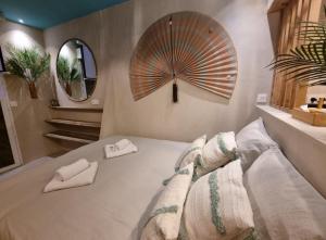 Appartements Les Spas de la Mer, Appart&Spa Aloha, 100m de la plage, Plein coeur du Grau : photos des chambres