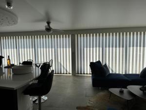 Appartements 100m2 de paradis en total vue Mer : photos des chambres