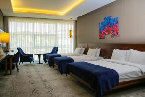 Comfort Triple Room room in Gold Majesty Hotel