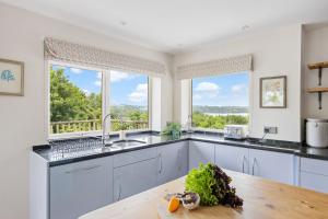 Rocket House - Large family home perched above the river