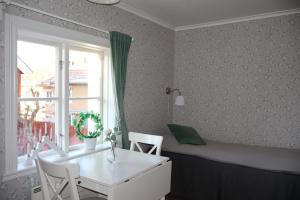 Basic Triple Room with Shared Bathroom room in STF Hostel Mariestad