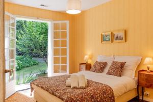 Maisons de vacances Magnifique Maison Paisible avec Piscine : photos des chambres