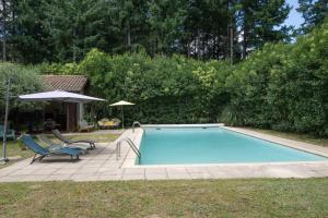 Maisons de vacances Magnifique Maison Paisible avec Piscine : photos des chambres