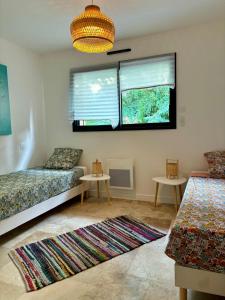 Maisons de vacances Maison en bois Lacanau centre : photos des chambres