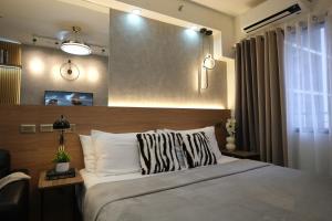 Staycation near Mall of Asia, Condotel with King Bed