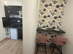 Appartements Le Chic & Relax, proche Centrex : photos des chambres