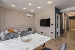 Adastra apartments with private parking and floor heating 