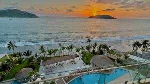 Espectacular condo Pie de Playa Vista al mar, en Camino al mar