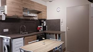 Appartements T2 saint jean du Bruel : photos des chambres