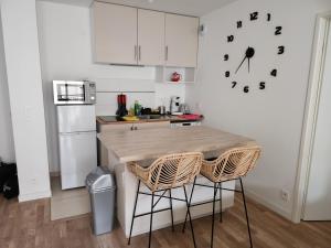 Appartements 2 Pieces calme proche Paris : photos des chambres