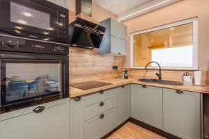 Adastra apartments with private parking and floor heating 