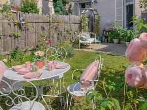 Appartements Le Jardin Des Delices charming house in Troyes : photos des chambres