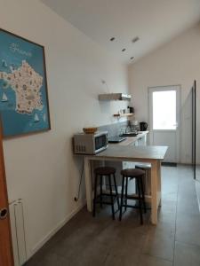 Maisons de vacances Maisonnette proche mer : photos des chambres