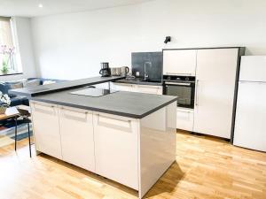 Appartements Appartement cote jardin - centre : photos des chambres
