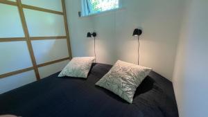 Modernt gästhus med två sovrum och sovmöjlighet för upp till fem personer