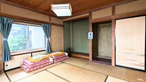 A traditional Japanese house located at the foot of the Northern Alps One Little Sheeps House