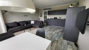 Duinzicht, ruim appartement met terras op de begane grond nabij strand