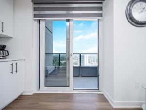 City View 1BR Condo - King Bed & Private Balcony