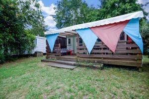 Campings Mobil-home climatise, camping 3etoiles, 5 min du Lac et a 15 min de Mimizan-Plage : photos des chambres