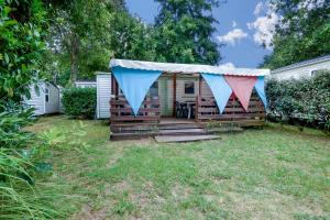 Campings Mobil-home climatise, camping 3etoiles, 5 min du Lac et a 15 min de Mimizan-Plage : photos des chambres