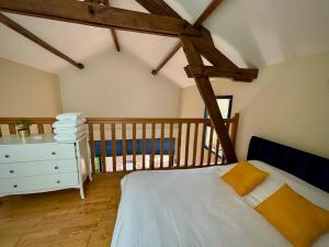 Maisons de vacances la Maison sous les Arbres - Duplex, jardin et spa : photos des chambres