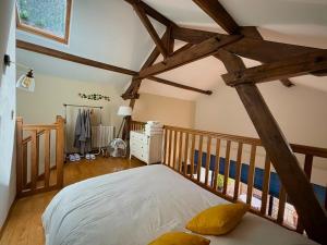 Maisons de vacances la Maison sous les Arbres - Duplex, jardin et spa : photos des chambres
